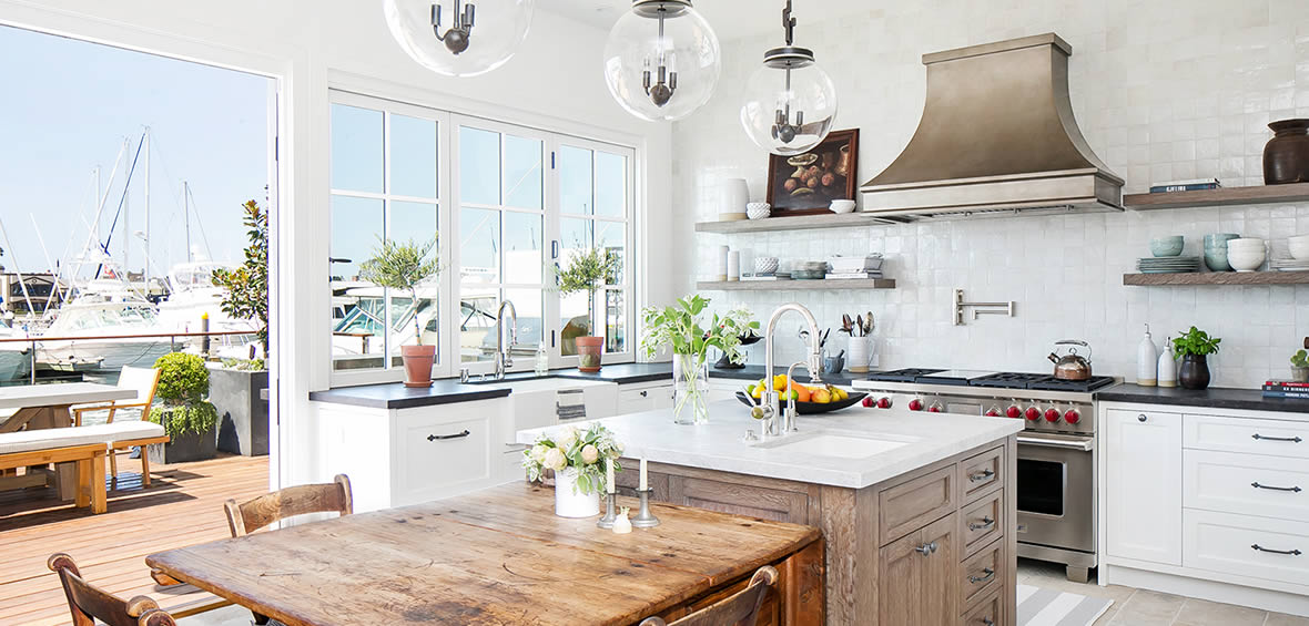 Custom stainless steel range hood installed in California.