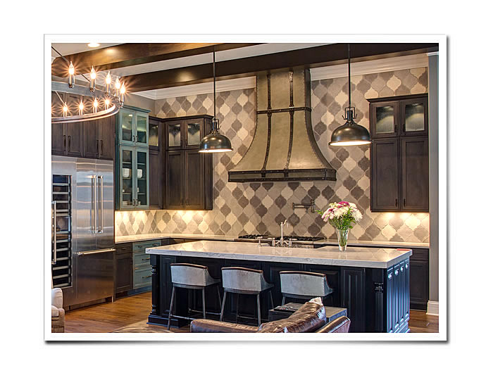 Traditional Sweep Range Hood in stainless steel and copper installed in a kitchen.